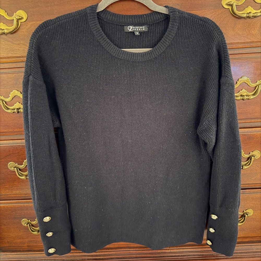 Elegant Black Crewneck Sweater with Gold Button Accents